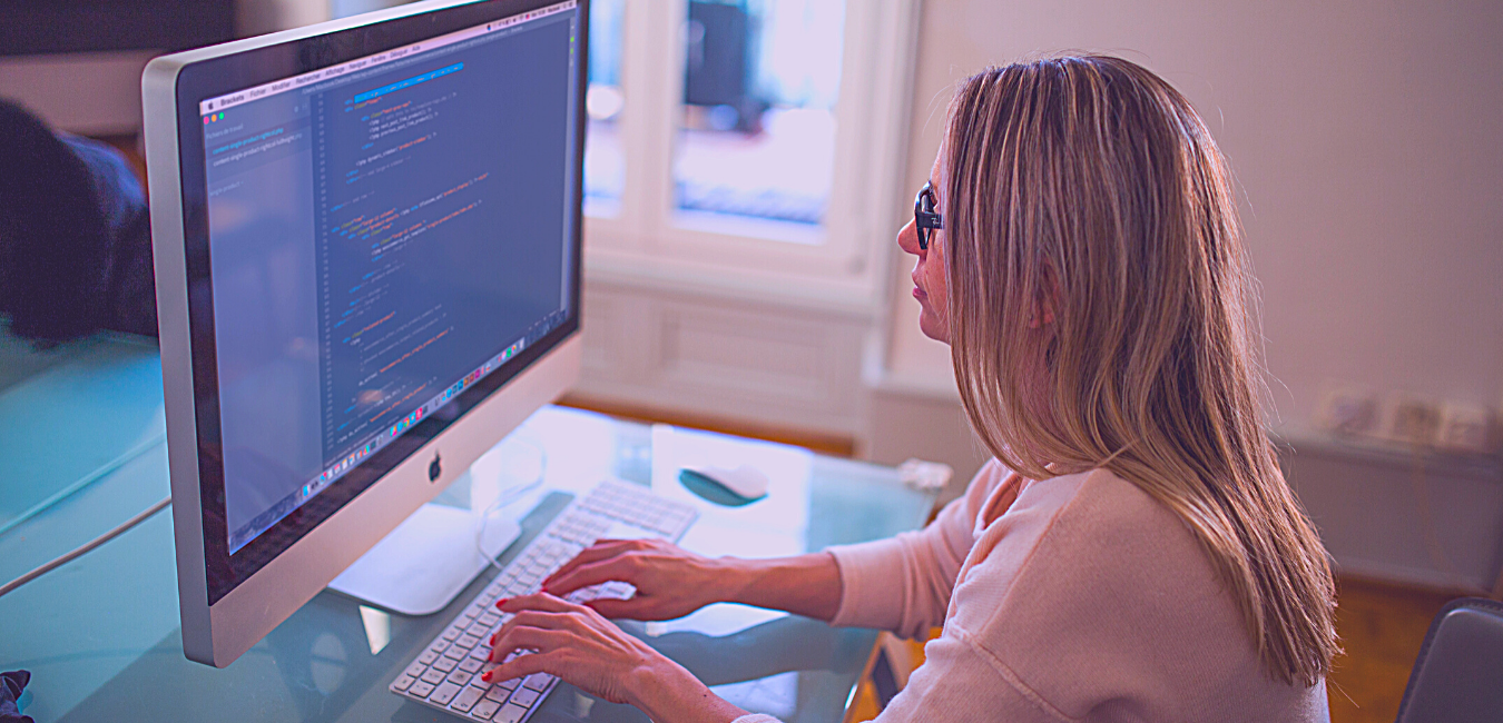 Cybersecurity analyst at a computer